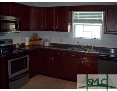 Kitchen. Kitchen comes w/ SS stove/oven, microwave