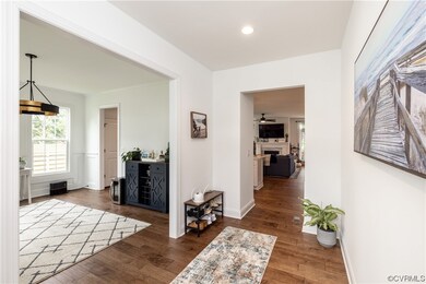 Hallway featuring hardwood flooring