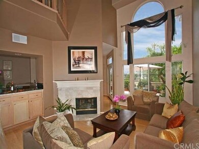 Soaring Ceilings, Fireplace, and Large Windows in 