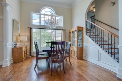 Gorgeous windows bring natural light into the Formal Dining Room