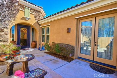 Front Patio & First Casita - Upon entering the gate, we have the first Casita to the right and the main house straight ahead