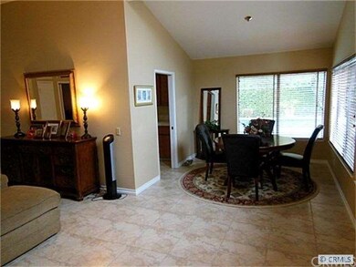 OPEN FLOOR PLAN GLOWS FROM ENTRY TO DINING ROOM