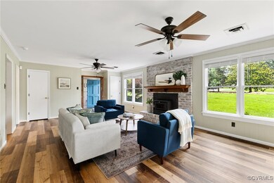 New ceiling fans and flooring in lower level famil