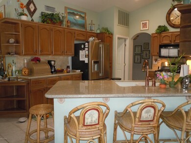 Kitchen has handy breakfast bar