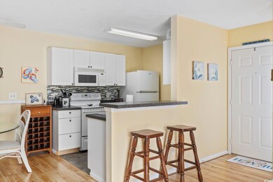 Kitchen featuring light hardwood / wood-style floo