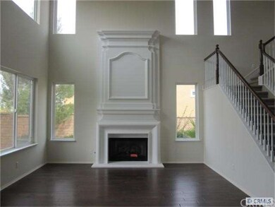 Formal Living room with Cathedral ceilings, hardwo