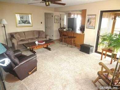Family Room. SPACIOUS FAMILY ROOM WITH WOOD STOVE.