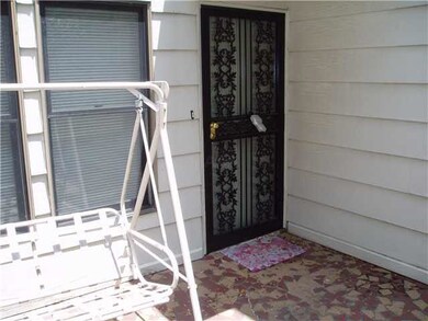 There is a courtyard-style patio located at the fr