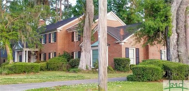 FULL BRICK, STATELY CURB APPEAL
