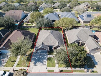 Aerial perspective of suburban area with property parcel outlined