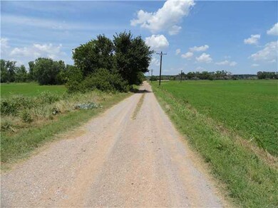 Exterior Front. road looking north