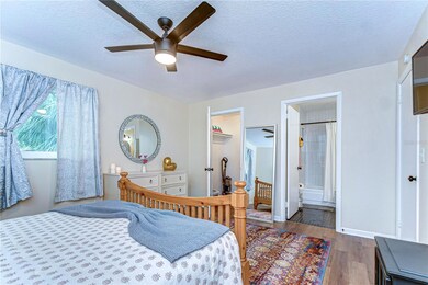 The bedroom features a large walk in closet and a bathroom ensuite
