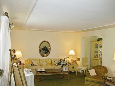 Living Room. Walls and ceiling are plaster with ce
