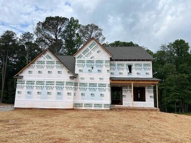 View of front of property with a shingled roof