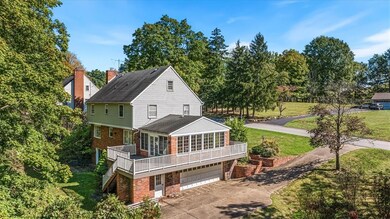 View of the side of the home showing the deck and