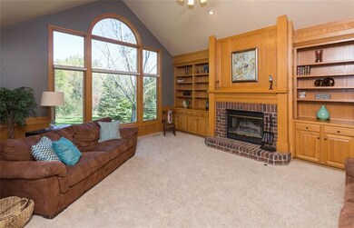 Main floor family room. This is open to the eat in