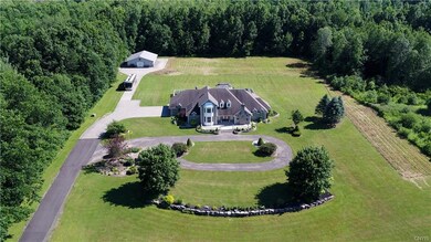 This Home has it all! Drive up to the Pole Barn/Ma