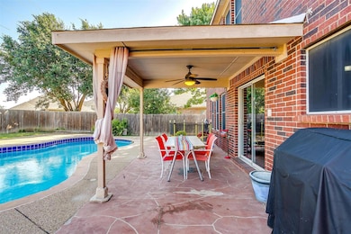 View of swimming pool, a patio, ceiling fan, a gri