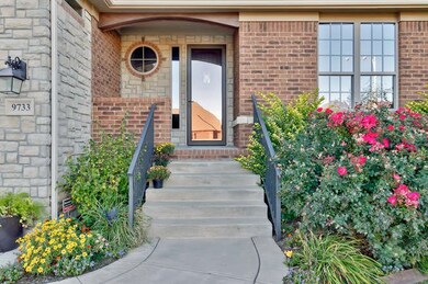 Beautiful landscaping outlines the walking path up