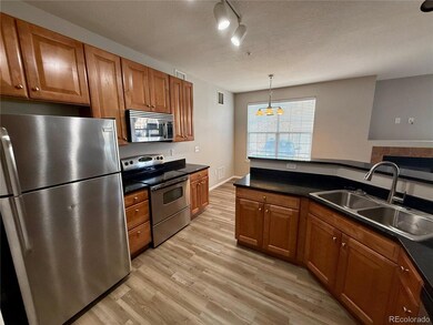 Kitchen w/ Stainless Steel Appliances & Granite Countertops