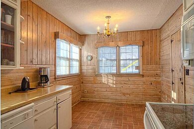 Kitchen. Kit eat in area very bright lots of windo