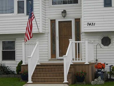 Exterior Front. Great entrance to two story foyer.