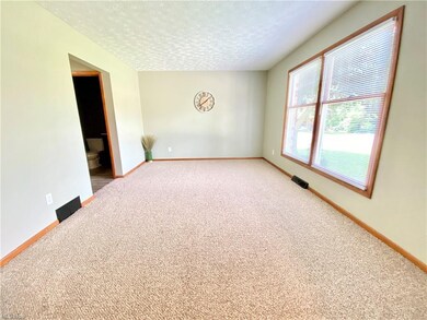 The Living Room has a large picture window allowing an abundance of natural light.