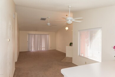 BREAKFAST BAR AREA FACING GREAT ROOM