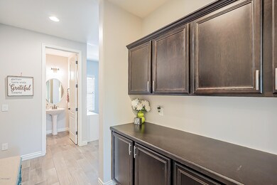 Hallway to Powder Bath & Play Room