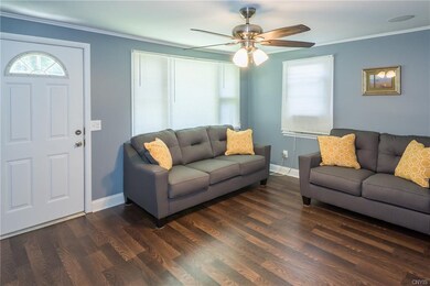 The spacious living room easily accommodates overs