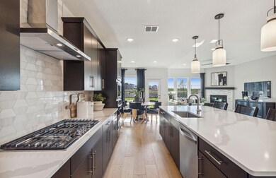 Expansive kitchen with ample cabinet space  *Photo