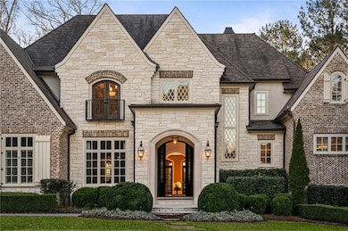 This inviting front porch creates a warm and welco