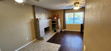 Unfurnished living room with tile flooring, ceilin