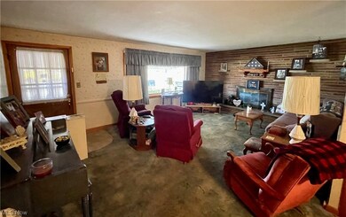Living room with dark colored carpet