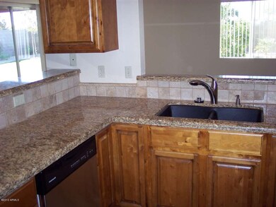 See Backyard from Kitchen