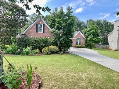 View of front of home featuring brick siding