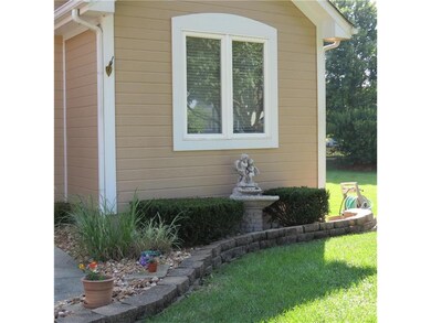 Landscaped nicely. Large shade tree in yard.