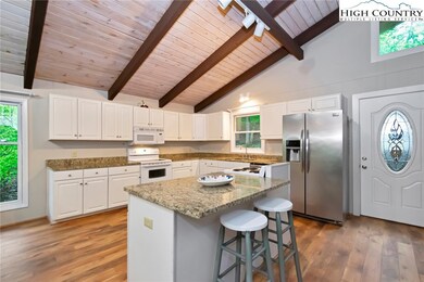 With 2 stoves and 2 refrigerators, all the cooks c