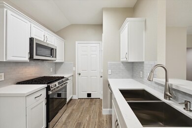 Bright and white kitchen, modern tile backsplash a