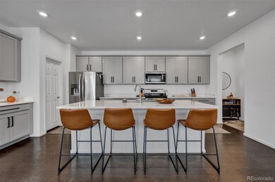 Big kitchen island with lovely quartz counter