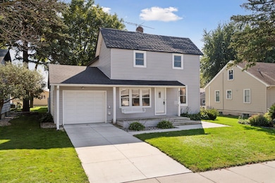 Newer concrete driveway leads to attached 1 car garage. Additional 2 car detached garage in back of home.