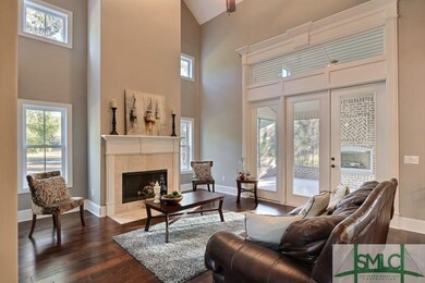 2 Story Family Room ~ Gas Fireplace ~ Tons of Natural Light