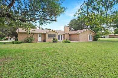 View of front of property with a front lawn