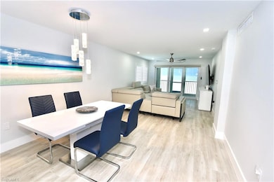 Dining room featuring baseboards, a ceiling fan, a