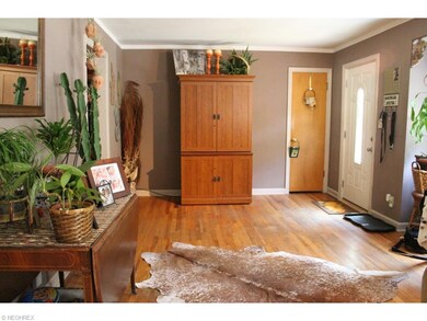 Original hardwood graces the south end of the livi
