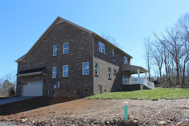 Side load garage.  Large covered patio looks over corner lot.  Huge common areas border!!!