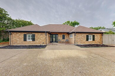 Ranch-style home featuring a patio