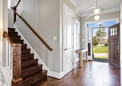 Enter the Front door into the Foyer where beautifu
