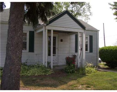 Exterior Front. Corner lot, long driveway in rear.