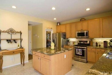 Gourmet Kitchen with walk-in pantry and lava grani